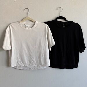 Pair of Athleta Cropped Zephyr Cropped Tees in Ivory and Black